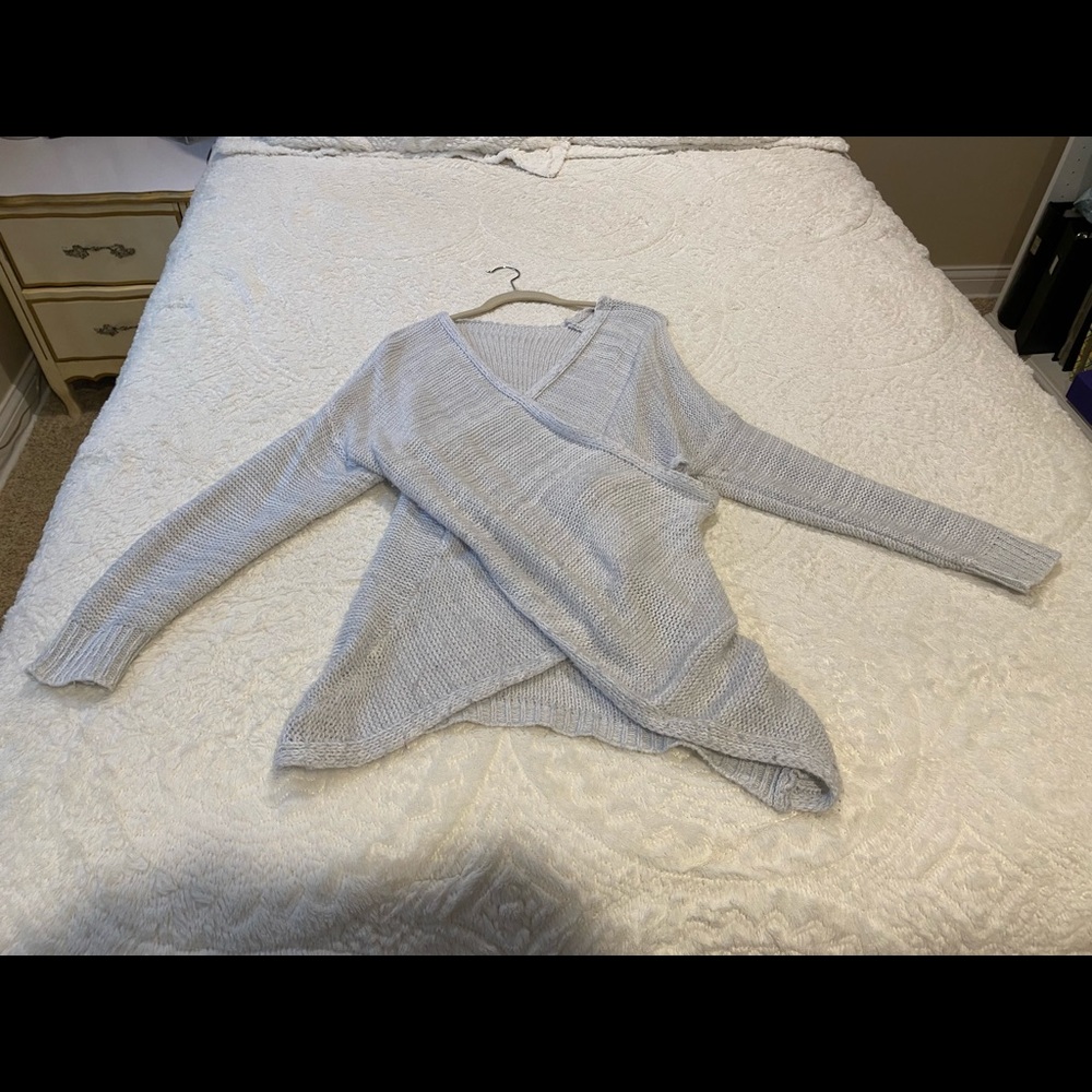 Large cross sweater